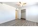 Bedroom featuring wood-look flooring, closet, and a ceiling fan at 3115 N 55Th Ave, Phoenix, AZ 85031