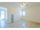 Bedroom showcases neutral walls, tile flooring, ceiling fan, and a 'welcome' sign at 3115 N 55Th Ave, Phoenix, AZ 85031