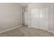 Bedroom with carpet flooring and a closet with sliding doors at 31822 N Bandit Rd, San Tan Valley, AZ 85143