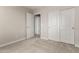 Bedroom featuring a closet with sliding doors, providing storage and a clean aesthetic at 31822 N Bandit Rd, San Tan Valley, AZ 85143