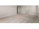 Carpeted bedroom with view to ensuite bath, offering a comfortable and convenient layout at 31822 N Bandit Rd, San Tan Valley, AZ 85143