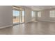 Living room with tile flooring, recessed lighting, and access to the backyard at 31822 N Bandit Rd, San Tan Valley, AZ 85143