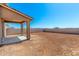 A spacious backyard with block fencing and covered patio at 31850 N Bandit Rd, San Tan Valley, AZ 85143