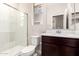 Bathroom featuring a walk-in shower with glass doors, a toilet, and a vanity with a mirror at 31850 N Bandit Rd, San Tan Valley, AZ 85143