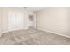 Cozy bedroom featuring neutral carpeting and walls, complete with a closet with bi-fold doors at 31850 N Bandit Rd, San Tan Valley, AZ 85143