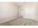Bedroom with carpet flooring, a closet with sliding doors, and a view of the upstairs hallway at 31850 N Bandit Rd, San Tan Valley, AZ 85143