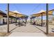 Outdoor grill station featuring multiple cooking areas and shaded seating for community gatherings at 3597 E Henson St, San Tan Valley, AZ 85140