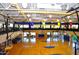 Spacious indoor basketball court with pristine wooden floors and ample seating at 40613 N Candlewyck Ln, Anthem, AZ 85086