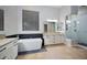 Bright bathroom featuring a soaking tub, granite countertops, and a glass-enclosed shower at 40613 N Candlewyck Ln, Anthem, AZ 85086