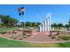 Picturesque park featuring a Veterans Memorial with flags and benches at 40613 N Candlewyck Ln, Anthem, AZ 85086