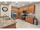 Well-equipped kitchen with stainless steel appliances, granite countertops, and ample cabinet space at 4230 W Palace Station Rd, New River, AZ 85087