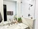 Close up of a modern bathroom with marble vanity, updated fixtures and glass shower at 541 W Marlette Ave, Phoenix, AZ 85013