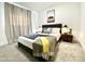 Modern bedroom with a comfortable bed, stylish decor, and ample natural light at 541 W Marlette Ave, Phoenix, AZ 85013