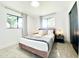 Cozy bedroom features a comfortable bed, natural light, and stylish decor at 541 W Marlette Ave, Phoenix, AZ 85013