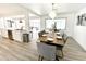 Bright dining room with a modern table setting and stylish lighting fixtures at 541 W Marlette Ave, Phoenix, AZ 85013
