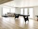 Open-concept living area with stylish furniture, modern lighting, and seamless flow to outdoor spaces at 541 W Marlette Ave, Phoenix, AZ 85013