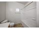 Cozy bathroom featuring a shower-over-tub, neutral tones, and tiled flooring at 5418 W Carson Rd, Laveen, AZ 85339