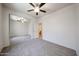 Cozy bedroom with mirrored closet doors and neutral-toned carpeting at 5418 W Carson Rd, Laveen, AZ 85339