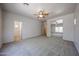 Spacious bedroom with natural light and carpet at 5418 W Carson Rd, Laveen, AZ 85339