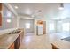 Eat in kitchen with tile floors, cabinets and plenty of natural light at 5418 W Carson Rd, Laveen, AZ 85339