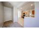 Open kitchen featuring a view of the carpeted Gathering room at 5418 W Carson Rd, Laveen, AZ 85339
