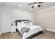 Inviting bedroom featuring a plush bed, stylish decor, and abundant natural light at 6317 S Banning St, Gilbert, AZ 85298