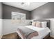 Serene bedroom featuring a comfortable bed, stylish decor, and soft lighting at 6317 S Banning St, Gilbert, AZ 85298