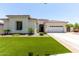 Charming single-story home with well-maintained lawn and desert landscaping at 6317 S Banning St, Gilbert, AZ 85298