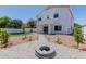 Beautiful backyard featuring a paved patio and a built-in fire pit at 742 W Vineyard Plains Dr, San Tan Valley, AZ 85143