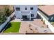 Aerial view of backyard showcasing patio, turf, and landscaping at 742 W Vineyard Plains Dr, San Tan Valley, AZ 85143