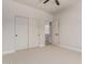 Bright bedroom with closet, neutral paint and carpet and an opening to another room at 742 W Vineyard Plains Dr, San Tan Valley, AZ 85143