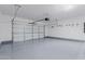 Clean, spacious garage with epoxy flooring and ample storage at 742 W Vineyard Plains Dr, San Tan Valley, AZ 85143