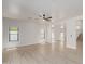Bright living room with wood-look floors and lots of natural light at 742 W Vineyard Plains Dr, San Tan Valley, AZ 85143