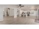 Open-concept living area flowing into a gourmet kitchen with stainless appliances at 742 W Vineyard Plains Dr, San Tan Valley, AZ 85143