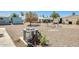 Low maintenance backyard with a rock landscape, mature trees, and a swing set at 8103 E Southern Ave # 170, Mesa, AZ 85209
