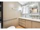 This bathroom has a single sink vanity with a neutral countertop and cabinet at 8103 E Southern Ave # 170, Mesa, AZ 85209