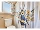Charming bathroom with toilet and bee-themed shower curtain at 8103 E Southern Ave # 170, Mesa, AZ 85209