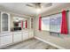 Bright dining area featuring built in cabinets, a serving counter and large window at 8103 E Southern Ave # 170, Mesa, AZ 85209