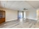 Sunlit living room showcasing new floors and access to the screened porch at 8103 E Southern Ave # 170, Mesa, AZ 85209
