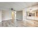 Open-concept living room featuring ceiling fan, and views into the dining area at 8103 E Southern Ave # 170, Mesa, AZ 85209