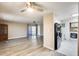 Expansive living area featuring the laundry and kitchen area at 8103 E Southern Ave # 170, Mesa, AZ 85209