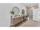 Contemporary bathroom showcasing dual sinks, mirrors, and a glass-enclosed shower with modern fixtures at 8213 E Sharon Dr, Scottsdale, AZ 85260