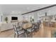 Spacious open-concept featuring a dining area, living room, and kitchen for a modern aesthetic at 8213 E Sharon Dr, Scottsdale, AZ 85260