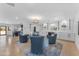 Spacious living room with modern lighting, wet bar and plenty of space for entertaining at 8213 E Sharon Dr, Scottsdale, AZ 85260