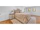 A cozy main bedroom features a comfortable bed, side table and decor at 8213 E Sharon Dr, Scottsdale, AZ 85260