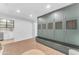 Mud room featuring green built-in lockers, brick floors, and a view into other rooms at 8213 E Sharon Dr, Scottsdale, AZ 85260