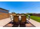 Spacious backyard featuring a patio and string lights, perfect for outdoor entertaining at 10625 S 55Th Dr, Laveen, AZ 85339