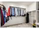 Walk-in closet with organized storage, hanging rods, and ample shelving at 10625 S 55Th Dr, Laveen, AZ 85339