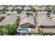 An aerial shot features a backyard swimming pool and landscaped yard at 11318 W Monte Vista Rd, Avondale, AZ 85392