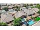 Aerial view highlighting a backyard pool and landscaping at 11318 W Monte Vista Rd, Avondale, AZ 85392